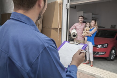 Storage facility staff observing safe handling practices and site controls