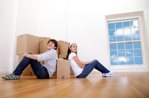 Office removals planning in Sevensisters with moving boxes and workspace setup